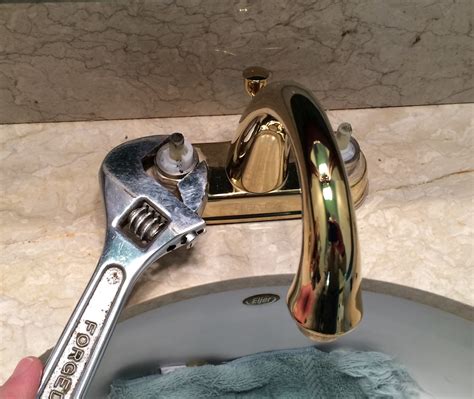 Next, drain the faucet by turning it on of course and grab a towel to place in the sink to prevent scratching. How to Fix a Leaking Bathroom Faucet - Quit that Drip