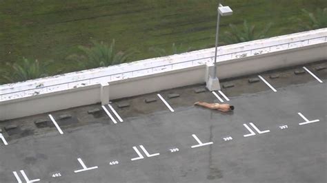 Naked Man On Rooftop Carpark Youtube