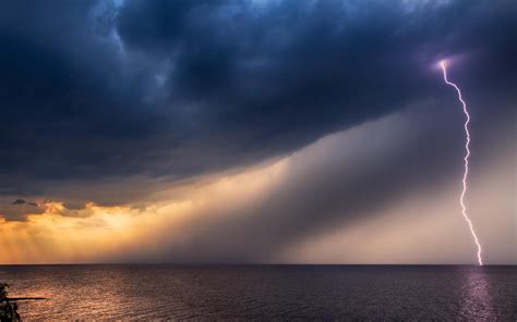 Lightning Black Clouds Storm At Sea