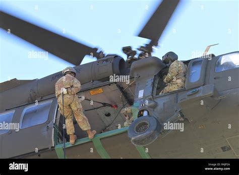 A Soldier Prepares To Rappel More Than 90 Feet From A Uh 60 Black Hawk