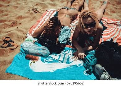 Sexy Bikini Girls Sunbathing Getting Fun Shutterstock