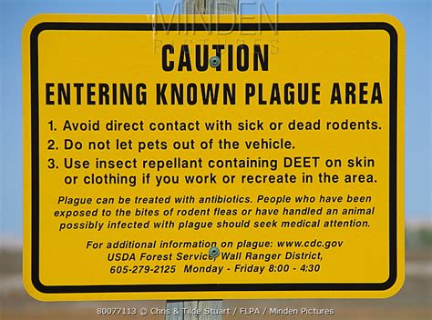 Minden Pictures Caution Entering Known Plague Area Sign Warning Of