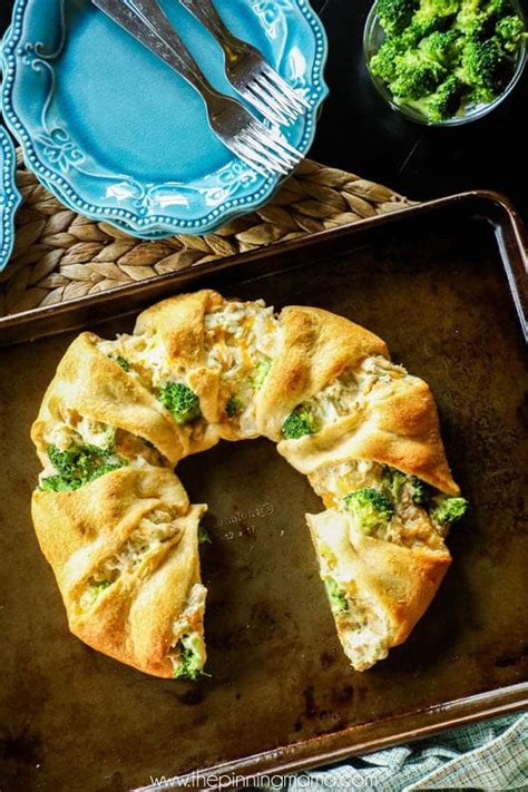 Unroll crescent roll dough, and separate into 16 triangles. Chicken Broccoli Cheddar Crescent Ring Recipe • The ...