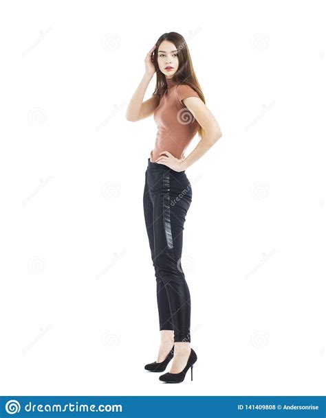 Full Body Young Beautiful Brunette Woman In Black Pants