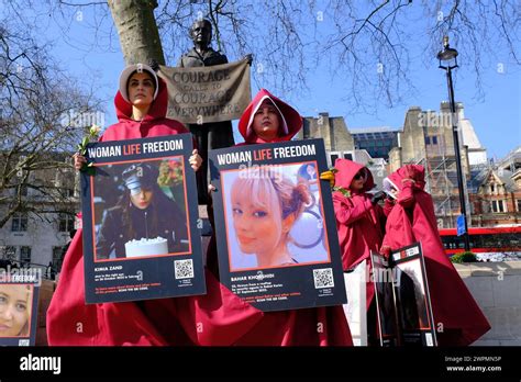 London, UK, 8th March, 2024. British-Iranians dressed in handmaids tale