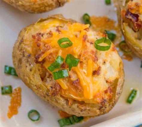 Butter a 1 1/2 to 2 pint pie dish and sprinkle with the breadcrumbs, pressing them to the base and sides with the back of a spoon. Twice Baked Potatoes made with russet potatoes, cheddar cheese, sour cream,… | Scalloped potato ...