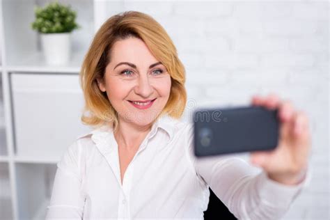 Cheerful Mature Business Woman Taking Selfie Photo With Smart Phone Stock Image Image Of Phone
