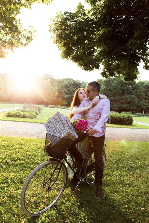 Romantic Couple Going On Picnic In Park By Bike Stock Image Image Of