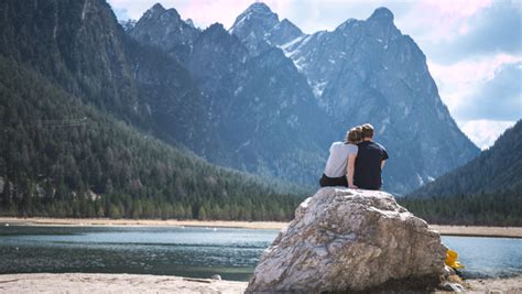 Romantic Couple Relaxing On Mountain River Scene Stock Photo Free Download