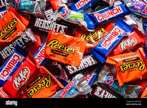 A Large Pile Of Snack Size Candy Bars For A Halloween Trick Or Treat