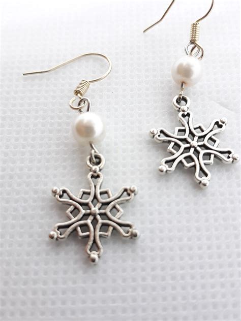 snowflake earrings clip or pierced christmas earrings pearl etsy