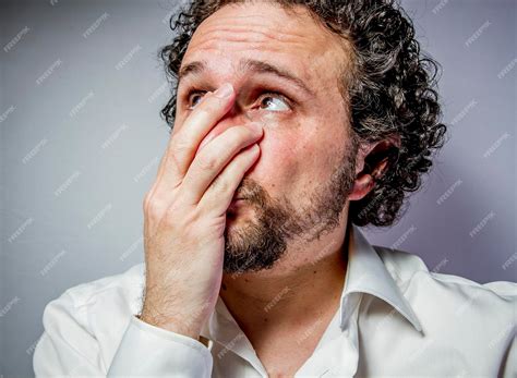 Premium Photo Sad Face Man With Intense Expression White Shirt