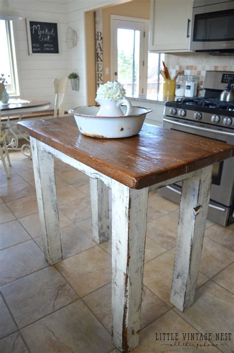 Rustic wood cabinets can be found in bright, modern designs or funky, industrial spaces. Rustic Kitchen Island - Little Vintage Nest