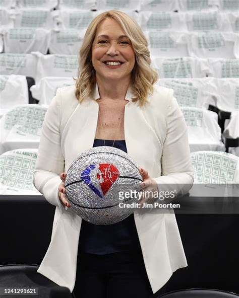 Analyst Doris Burke Poses With The Nba 75th Anniversary Ball During