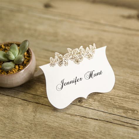 Torta bomboniere con calamite piantine con fiore per una festa elegante. Segnaposto matrimonio farfalle - Bomboniere matrimonio ...