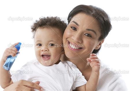 Smiling Mother Holding Her Toddler Son — Stock Photo © Jbryson 21424753