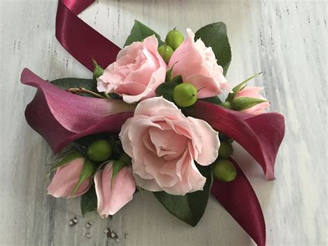 Burgundy Wrist Corsage With Mini Calla Lilies And Pink Spray Roses