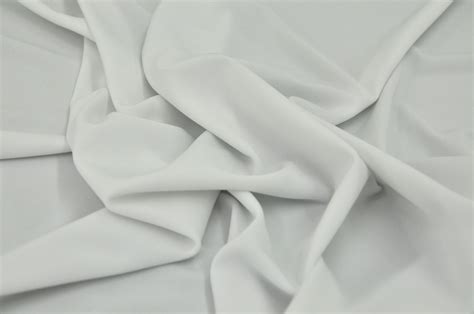 Polyester Knit White Dk Fabrics