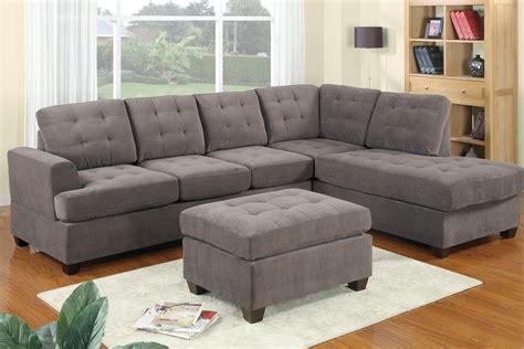 Bold Grey Sectional Sofa With Chaise Idea With Ottoman Coffee Table And White Area Rug And Wooden Floor 