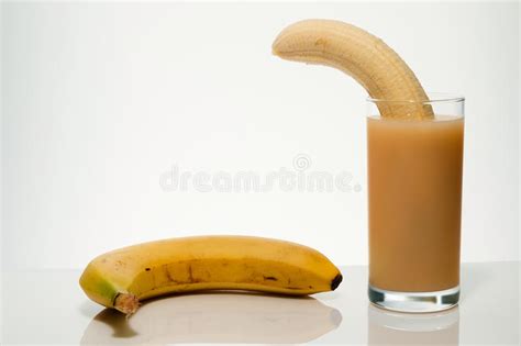 Ripe Banana Without Peel From The Tropics In A Glass With Banana Stock