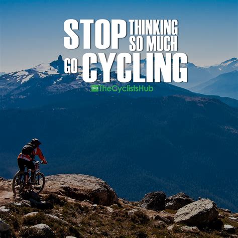 A Man Riding A Mountain Bike On Top Of A Rocky Hill With The Words Stop