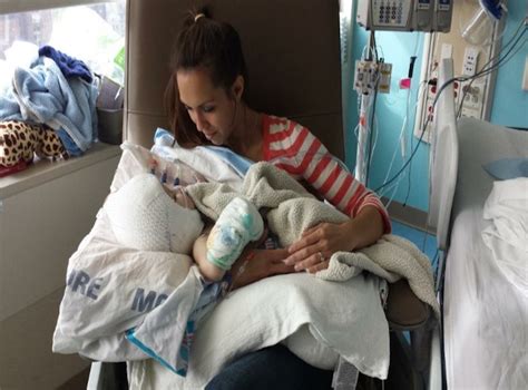 Mother Holds Formerly Conjoined Twin For First Time After Surgery The