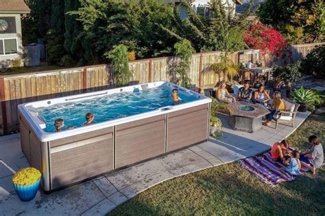 A Backyard Endless Pools Swimcross Exercise System X500 Swim Spa In