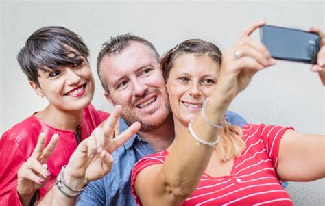 Group Of Friends Are Doing A Selfie Outdoor Stock Image Image Of