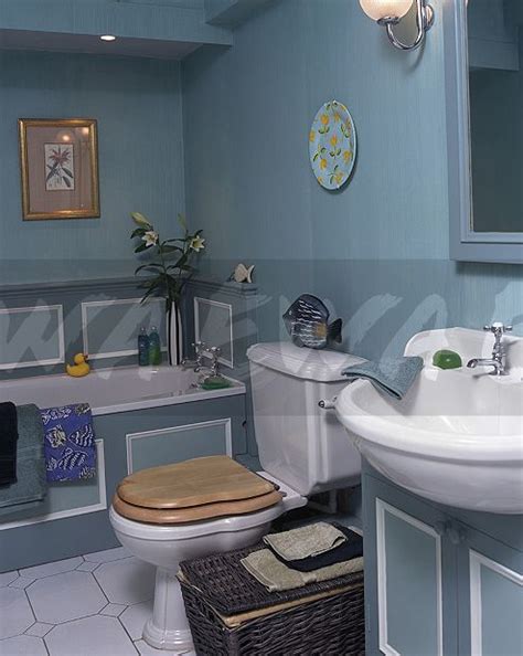 Find out more about the deceptively simple eggshell paint and when to effectively use it. Image: BLue painted panelling on bath in pale turquoise ...