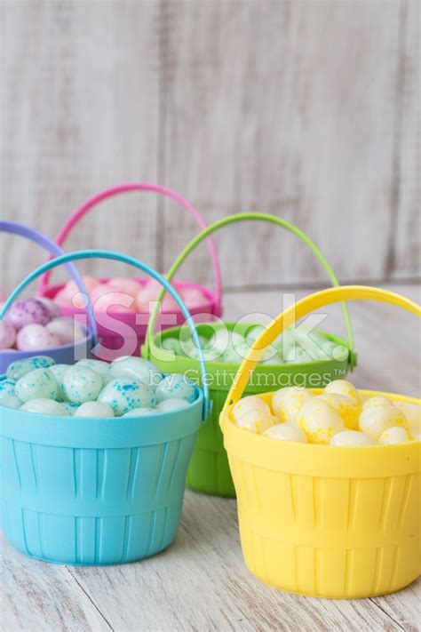 Pastel Jelly Beans In Colored Baskets For Easter Stock Photo Royalty