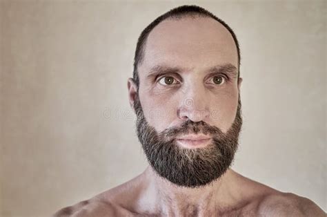 Portrait Of A Thinking Mature Naked Bearded Man The Man Looks Away