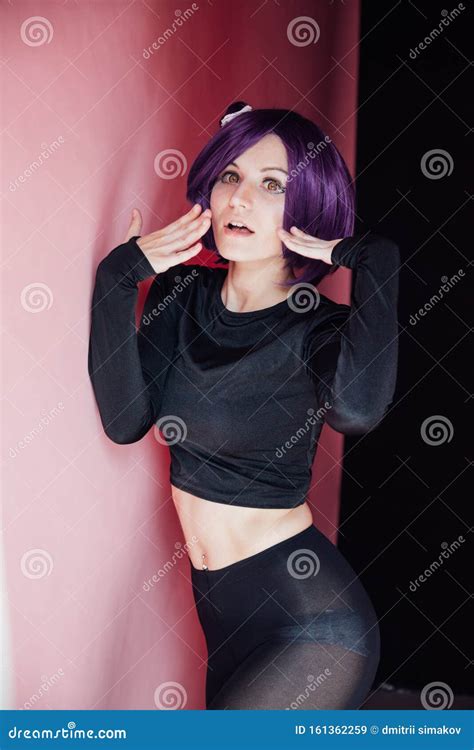 Portrait Of A Beautiful Woman Anime Cosplayer With Purple Hair Stock