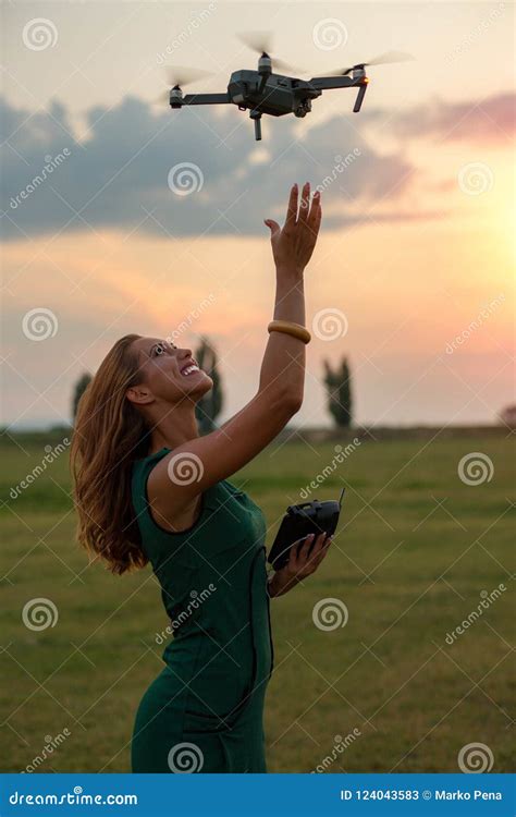 Young Woman Landing A Drone In Her Hand Stock Image Image Of Smile