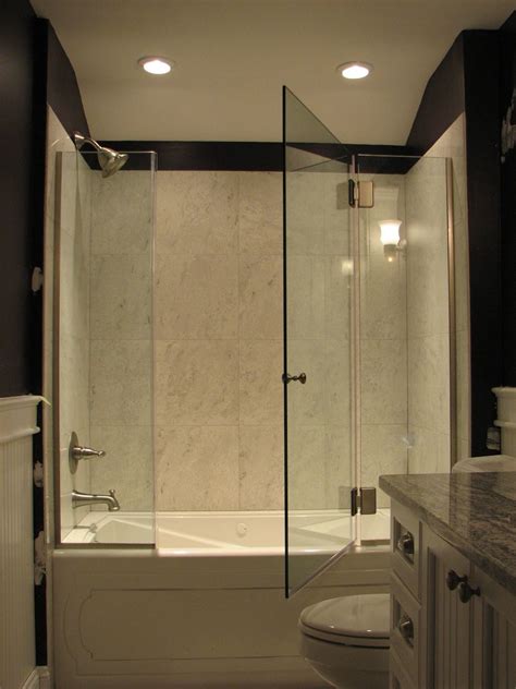 Frameless bathtub doors installation from quality frameless showers. Frameless panel +door+panel on a tub, glass-to-glass hinge ...