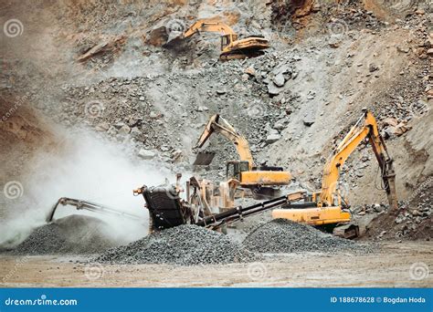 Heavy Duty Machinery Working On Quarry Open Pit Ore Mine Details With