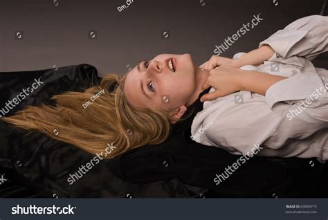 Crime Scene Strangled Girl Lying On A Floor Stock Photo