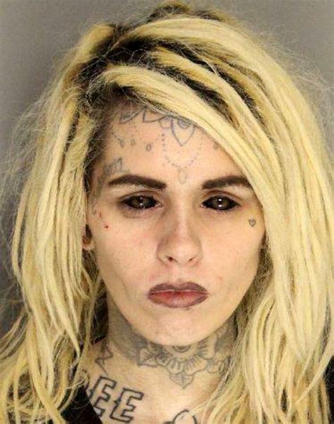 woman s police mugshot goes viral because she s got tattoos on her eyeballs metro news