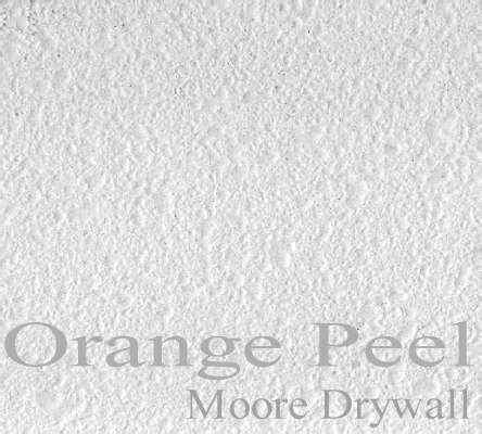 Applying textured ceiling spray (popcorn ceiling spray) to the garage ceiling. Orange Peel - Moore Drywall