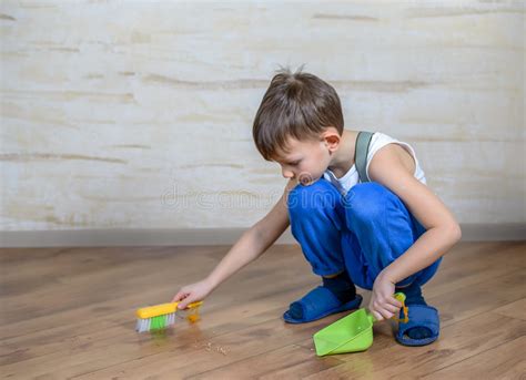 Child Using Toy Broom And Dustpan Stock Photo Image Of Indoors Child