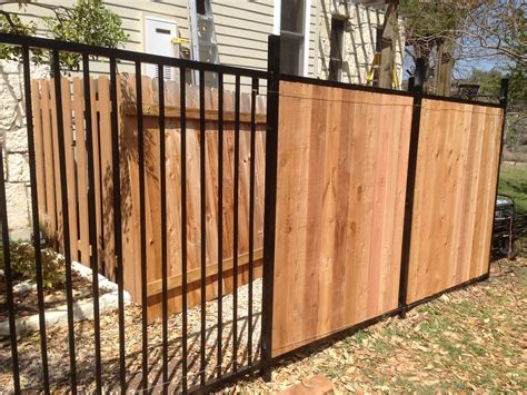 Custom Wrought Iron Fence Transitioning Into Privacy Cedar Fence Wood