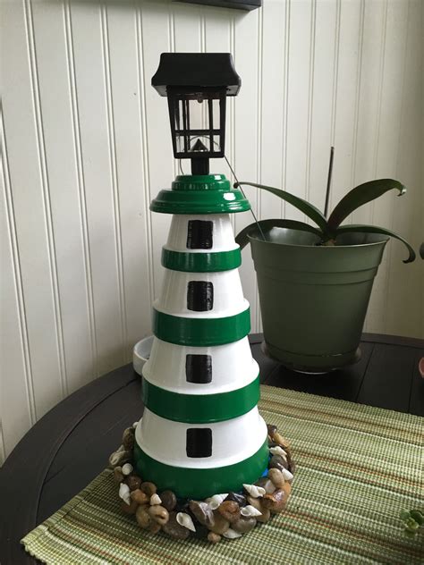 Green And White Lighthouse Made From Clay Pots Clay Flower Pots Clay