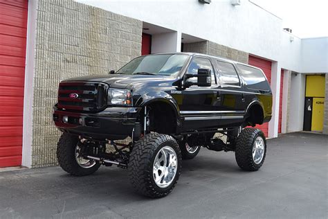 Lifted Ford Excursion Black Scheer Signature Detailing