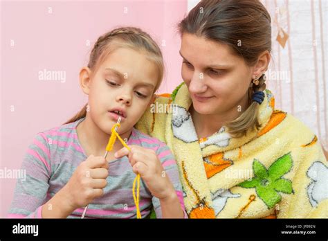 Mom Teaches Babe To Knit Seven Years Stock Photo Alamy