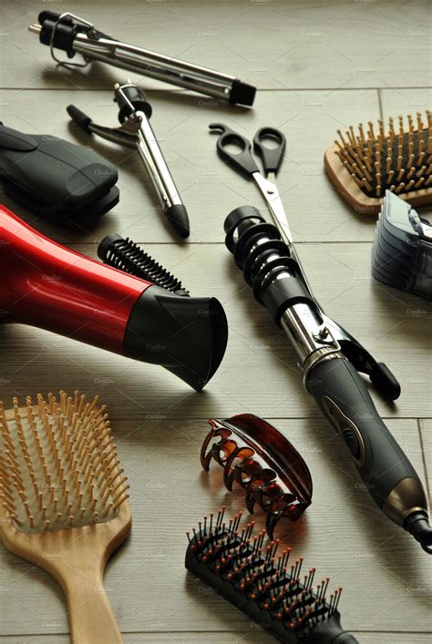 Hairdressing Tools On A Wooden Floor Featuring Hair Salon And Tools