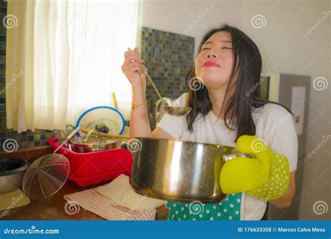 Lifestyle Portrait Of Young Pretty And Happy Asian Chinese Woman In
