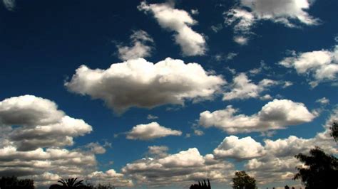 Beautiful Fluffy Clouds In Deep Blue Sky Timelapse Long