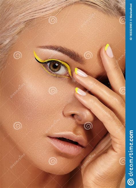Beautiful Tanned Skin Woman Sunburnt Girl Face With Natural Bronzed Make Up Yellow Manicure