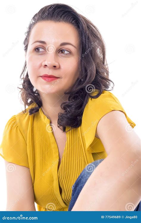 Beautiful Young Woman Sitting On Floor Against White Stock Image