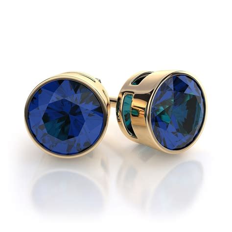 Bezel Set Blue Sapphire Gemstone Stud Earrings In K Yellow Gold In
