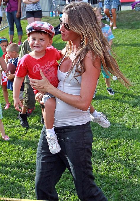 Gisele Bundchen Shows Off Her Growing Baby Bump In A White Tank As She